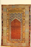 An illustration from The oriental rug; a monograph on eastern rugs and carpets, saddle-bags, mats & pillows, with a consideration of kinds and classes, types borders, figures, dyes, symbols, etc., together with some practical advice to collectors (1909)