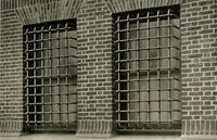 An illustration from Ornamental iron work : stairs, fire-escapes, marquises, gates, railings, grilles, fences. (1915)
