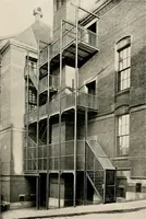 An illustration from Ornamental iron work : stairs, fire-escapes, marquises, gates, railings, grilles, fences. (1915)