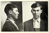An illustration from Photographs, descriptions and records of persons charged with violation of the postal laws (1916)