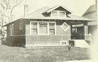 An illustration from The plan book of American dwellings : being a compilation of original home designs, showing actual photographic exteriors and floor plans of moderately priced bungalows, cottages, residences (1914)