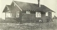 An illustration from The plan book of American dwellings : being a compilation of original home designs, showing actual photographic exteriors and floor plans of moderately priced bungalows, cottages, residences (1914)