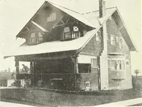 An illustration from The plan book of American dwellings : being a compilation of original home designs, showing actual photographic exteriors and floor plans of moderately priced bungalows, cottages, residences (1914)
