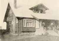 An illustration from The plan book of American dwellings : being a compilation of original home designs, showing actual photographic exteriors and floor plans of moderately priced bungalows, cottages, residences (1914)