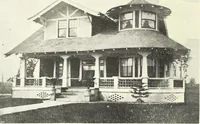 An illustration from The plan book of American dwellings : being a compilation of original home designs, showing actual photographic exteriors and floor plans of moderately priced bungalows, cottages, residences (1914)