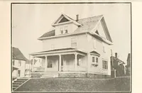 An illustration from The plan book of American dwellings : being a compilation of original home designs, showing actual photographic exteriors and floor plans of moderately priced bungalows, cottages, residences (1914)