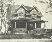 An illustration from The plan book of American dwellings : being a compilation of original home designs, showing actual photographic exteriors and floor plans of moderately priced bungalows, cottages, residences (1914)