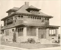 An illustration from The plan book of American dwellings : being a compilation of original home designs, showing actual photographic exteriors and floor plans of moderately priced bungalows, cottages, residences (1914)
