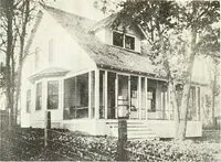 An illustration from The plan book of American dwellings : being a compilation of original home designs, showing actual photographic exteriors and floor plans of moderately priced bungalows, cottages, residences (1914)