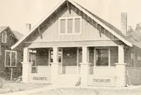 An illustration from The plan book of American dwellings : being a compilation of original home designs, showing actual photographic exteriors and floor plans of moderately priced bungalows, cottages, residences (1914)