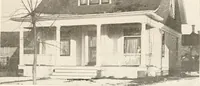 An illustration from The plan book of American dwellings : being a compilation of original home designs, showing actual photographic exteriors and floor plans of moderately priced bungalows, cottages, residences (1914)