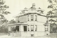 An illustration from The plan book of American dwellings : being a compilation of original home designs, showing actual photographic exteriors and floor plans of moderately priced bungalows, cottages, residences (1914)