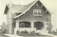 An illustration from The plan book of American dwellings : being a compilation of original home designs, showing actual photographic exteriors and floor plans of moderately priced bungalows, cottages, residences (1914)
