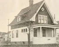 An illustration from The plan book of American dwellings : being a compilation of original home designs, showing actual photographic exteriors and floor plans of moderately priced bungalows, cottages, residences (1914)