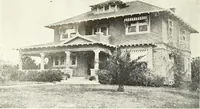 An illustration from The plan book of American dwellings : being a compilation of original home designs, showing actual photographic exteriors and floor plans of moderately priced bungalows, cottages, residences (1914)