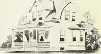 An illustration from The plan book of American dwellings : being a compilation of original home designs, showing actual photographic exteriors and floor plans of moderately priced bungalows, cottages, residences (1914)