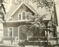 An illustration from The plan book of American dwellings : being a compilation of original home designs, showing actual photographic exteriors and floor plans of moderately priced bungalows, cottages, residences (1914)