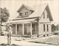 An illustration from The plan book of American dwellings : being a compilation of original home designs, showing actual photographic exteriors and floor plans of moderately priced bungalows, cottages, residences (1914)