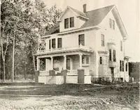An illustration from The plan book of American dwellings : being a compilation of original home designs, showing actual photographic exteriors and floor plans of moderately priced bungalows, cottages, residences (1914)