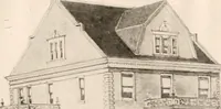 An illustration from The plan book of American dwellings : being a compilation of original home designs, showing actual photographic exteriors and floor plans of moderately priced bungalows, cottages, residences (1914)