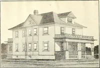 An illustration from The plan book of American dwellings : being a compilation of original home designs, showing actual photographic exteriors and floor plans of moderately priced bungalows, cottages, residences (1914)