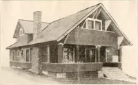 An illustration from The plan book of American dwellings : being a compilation of original home designs, showing actual photographic exteriors and floor plans of moderately priced bungalows, cottages, residences (1914)