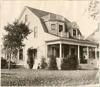 An illustration from The plan book of American dwellings : being a compilation of original home designs, showing actual photographic exteriors and floor plans of moderately priced bungalows, cottages, residences (1914)