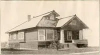 An illustration from The plan book of American dwellings : being a compilation of original home designs, showing actual photographic exteriors and floor plans of moderately priced bungalows, cottages, residences (1914)
