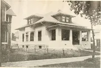 An illustration from The plan book of American dwellings : being a compilation of original home designs, showing actual photographic exteriors and floor plans of moderately priced bungalows, cottages, residences (1914)