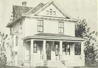 An illustration from The plan book of American dwellings : being a compilation of original home designs, showing actual photographic exteriors and floor plans of moderately priced bungalows, cottages, residences (1914)