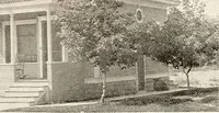 An illustration from The plan book of American dwellings : being a compilation of original home designs, showing actual photographic exteriors and floor plans of moderately priced bungalows, cottages, residences (1914)