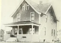 An illustration from The plan book of American dwellings : being a compilation of original home designs, showing actual photographic exteriors and floor plans of moderately priced bungalows, cottages, residences (1914)