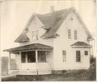 An illustration from The plan book of American dwellings : being a compilation of original home designs, showing actual photographic exteriors and floor plans of moderately priced bungalows, cottages, residences (1914)