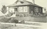 An illustration from The plan book of American dwellings : being a compilation of original home designs, showing actual photographic exteriors and floor plans of moderately priced bungalows, cottages, residences (1914)