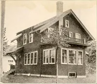 An illustration from The plan book of American dwellings : being a compilation of original home designs, showing actual photographic exteriors and floor plans of moderately priced bungalows, cottages, residences (1914)