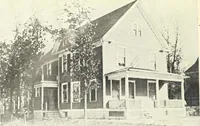 An illustration from The plan book of American dwellings : being a compilation of original home designs, showing actual photographic exteriors and floor plans of moderately priced bungalows, cottages, residences (1914)