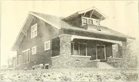 An illustration from The plan book of American dwellings : being a compilation of original home designs, showing actual photographic exteriors and floor plans of moderately priced bungalows, cottages, residences (1914)