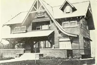 An illustration from The plan book of American dwellings : being a compilation of original home designs, showing actual photographic exteriors and floor plans of moderately priced bungalows, cottages, residences (1914)