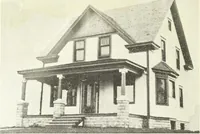 An illustration from The plan book of American dwellings : being a compilation of original home designs, showing actual photographic exteriors and floor plans of moderately priced bungalows, cottages, residences (1914)