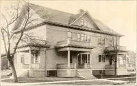 An illustration from The plan book of American dwellings : being a compilation of original home designs, showing actual photographic exteriors and floor plans of moderately priced bungalows, cottages, residences (1914)