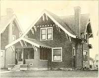 An illustration from The plan book of American dwellings : being a compilation of original home designs, showing actual photographic exteriors and floor plans of moderately priced bungalows, cottages, residences (1914)