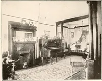 An illustration from The plan book of American dwellings : being a compilation of original home designs, showing actual photographic exteriors and floor plans of moderately priced bungalows, cottages, residences (1914)