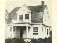 An illustration from The plan book of American dwellings : being a compilation of original home designs, showing actual photographic exteriors and floor plans of moderately priced bungalows, cottages, residences (1914)