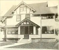 An illustration from The plan book of American dwellings : being a compilation of original home designs, showing actual photographic exteriors and floor plans of moderately priced bungalows, cottages, residences (1914)