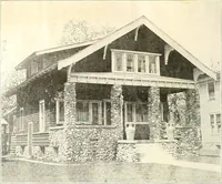 An illustration from The plan book of American dwellings : being a compilation of original home designs, showing actual photographic exteriors and floor plans of moderately priced bungalows, cottages, residences (1914)
