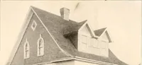 An illustration from The plan book of American dwellings : being a compilation of original home designs, showing actual photographic exteriors and floor plans of moderately priced bungalows, cottages, residences (1914)