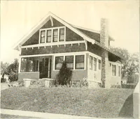 An illustration from The plan book of American dwellings : being a compilation of original home designs, showing actual photographic exteriors and floor plans of moderately priced bungalows, cottages, residences (1914)