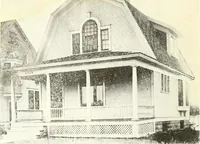 An illustration from The plan book of American dwellings : being a compilation of original home designs, showing actual photographic exteriors and floor plans of moderately priced bungalows, cottages, residences (1914)