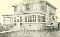 An illustration from The plan book of American dwellings : being a compilation of original home designs, showing actual photographic exteriors and floor plans of moderately priced bungalows, cottages, residences (1914)
