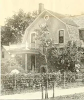 An illustration from The plan book of American dwellings : being a compilation of original home designs, showing actual photographic exteriors and floor plans of moderately priced bungalows, cottages, residences (1914)